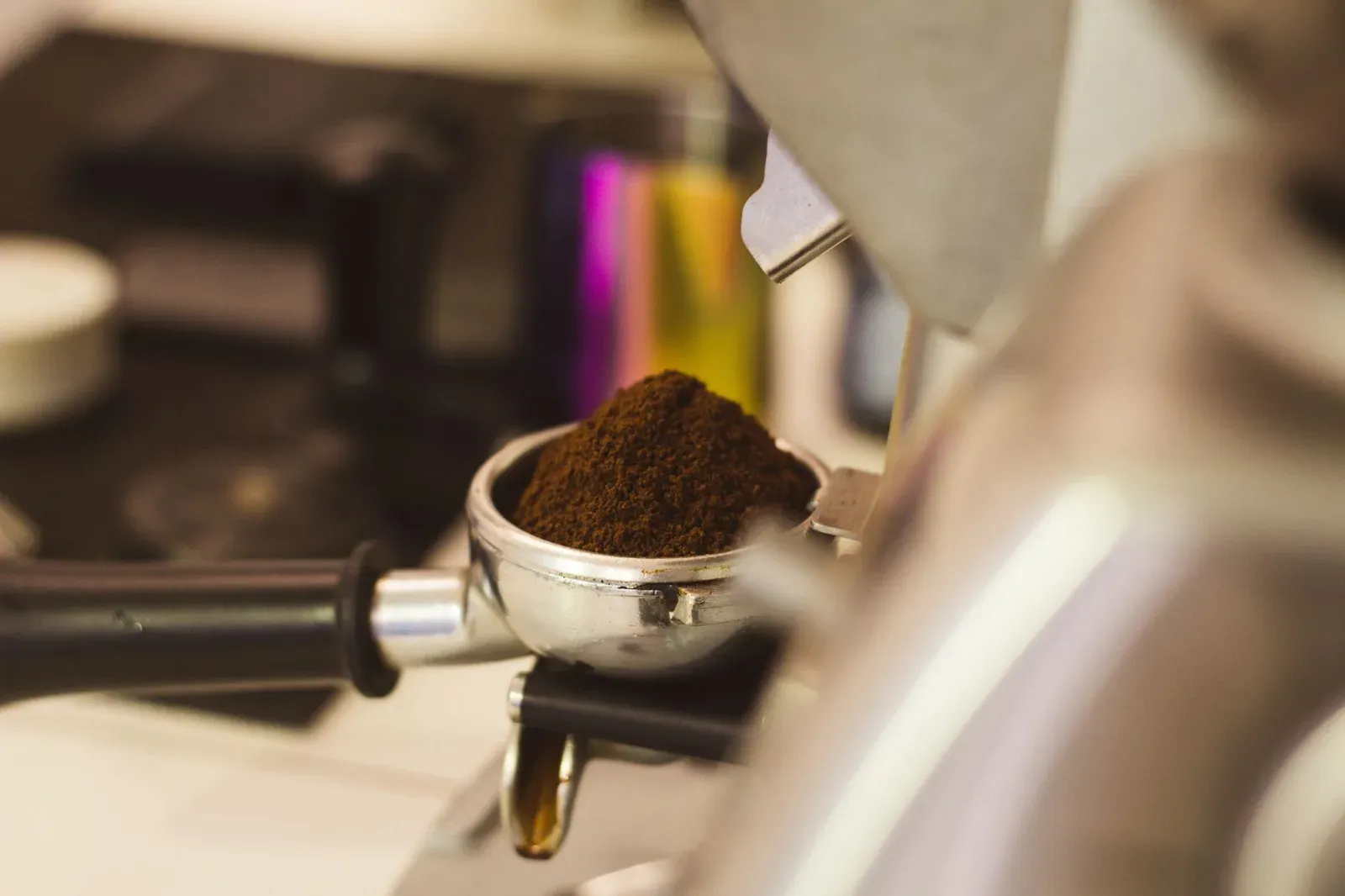 Freshly ground coffee levelled in a portafilter basket